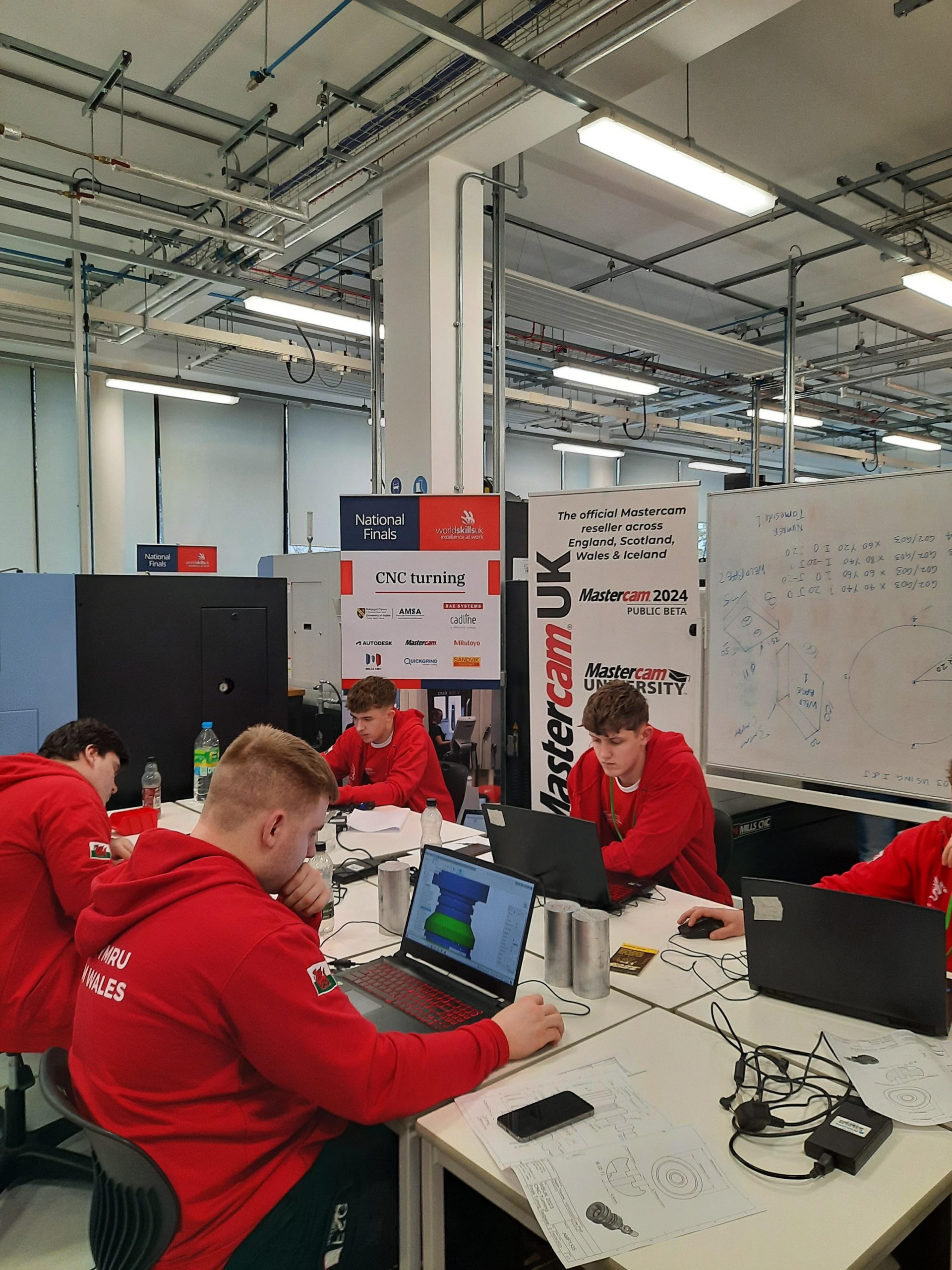 Students taking part in CNC programming and machining competition at Tameside College