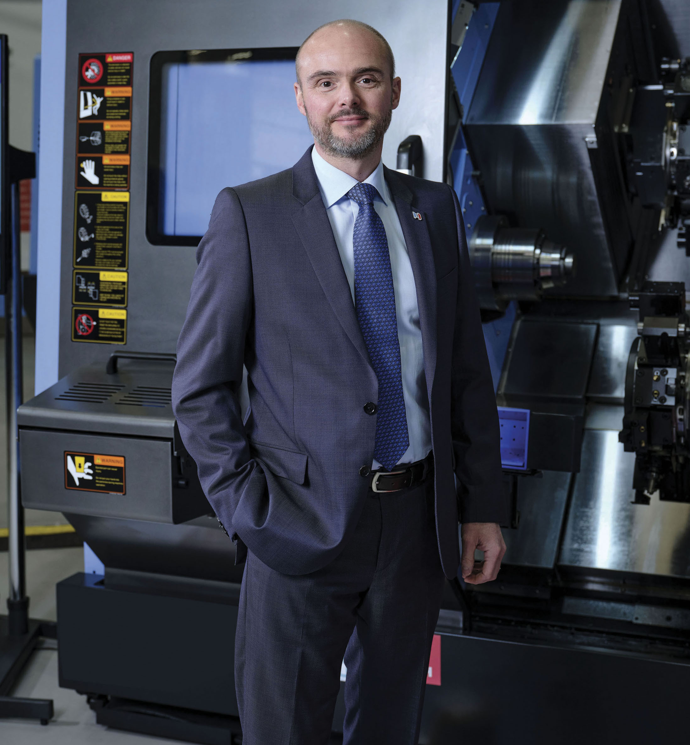 “Over the last 50-years, Mills has demonstrated that providing technically-excellent machine tool technologies and innovative automation systems, backed by world-class after-sales services, is a winning combination.

“The company has everything in place to ensure that its future is as successful as its past.”
Tony Dale, CEO of Mills CNC standing next to a CNS machine