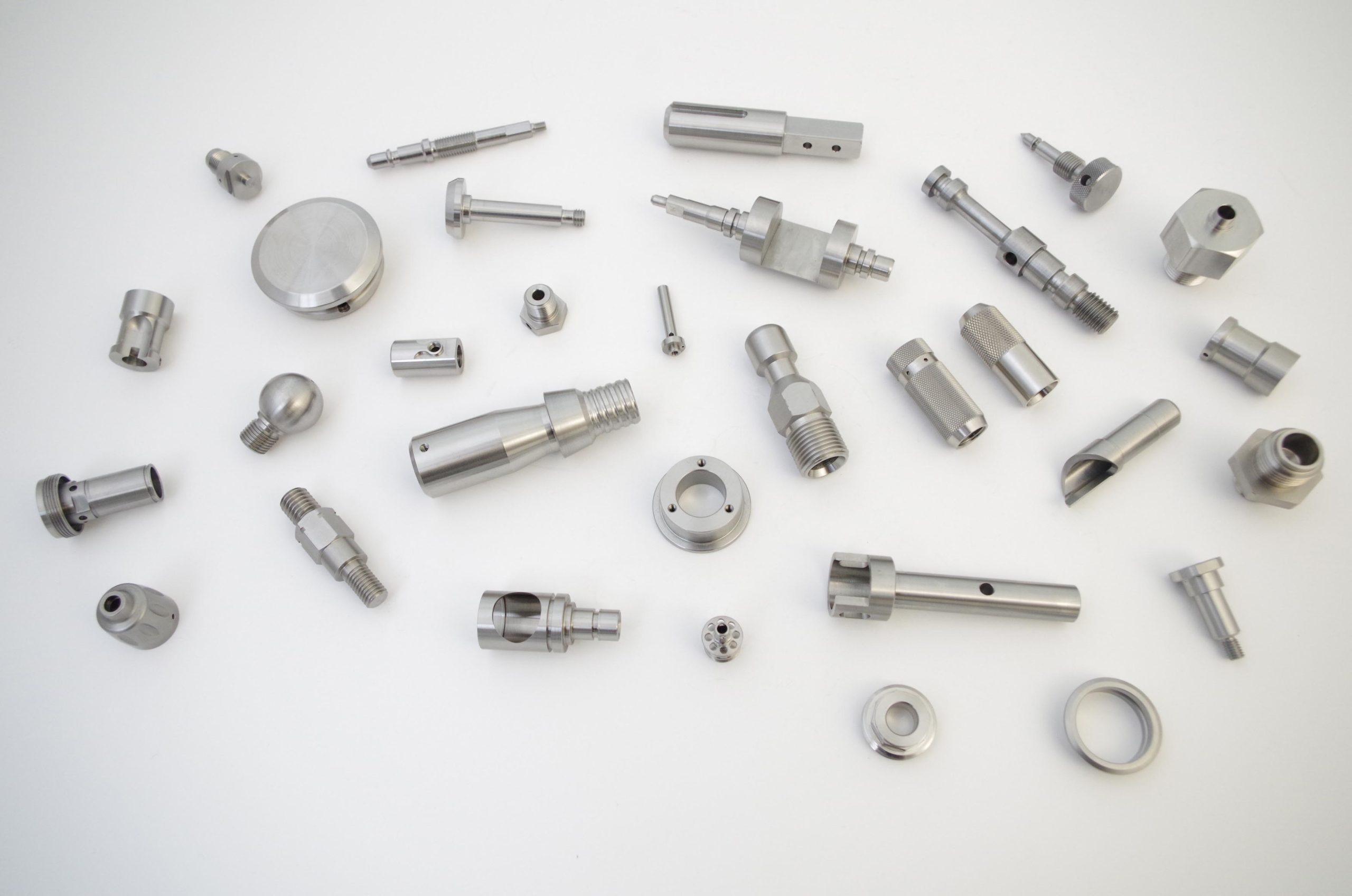 Selection of complex turned component parts machined by Sub-CNC