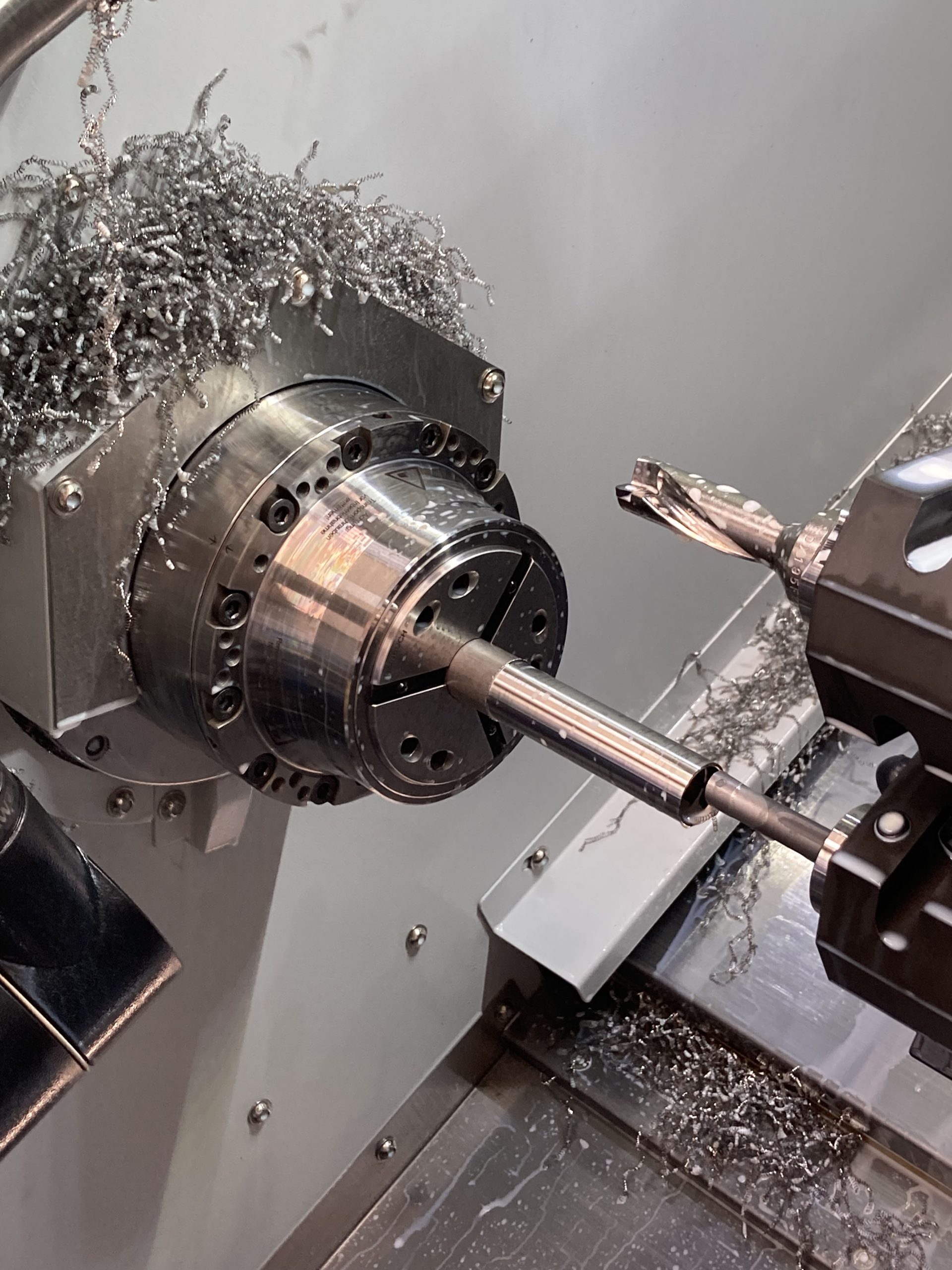 Interior of a DN Solutions’ Lynx 2100LSYB multi-tasking lathe at Monard Precision
